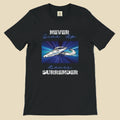 Black t-shirt with motivational graphic and text 'Never Give Up, Never Surrender' on a white background