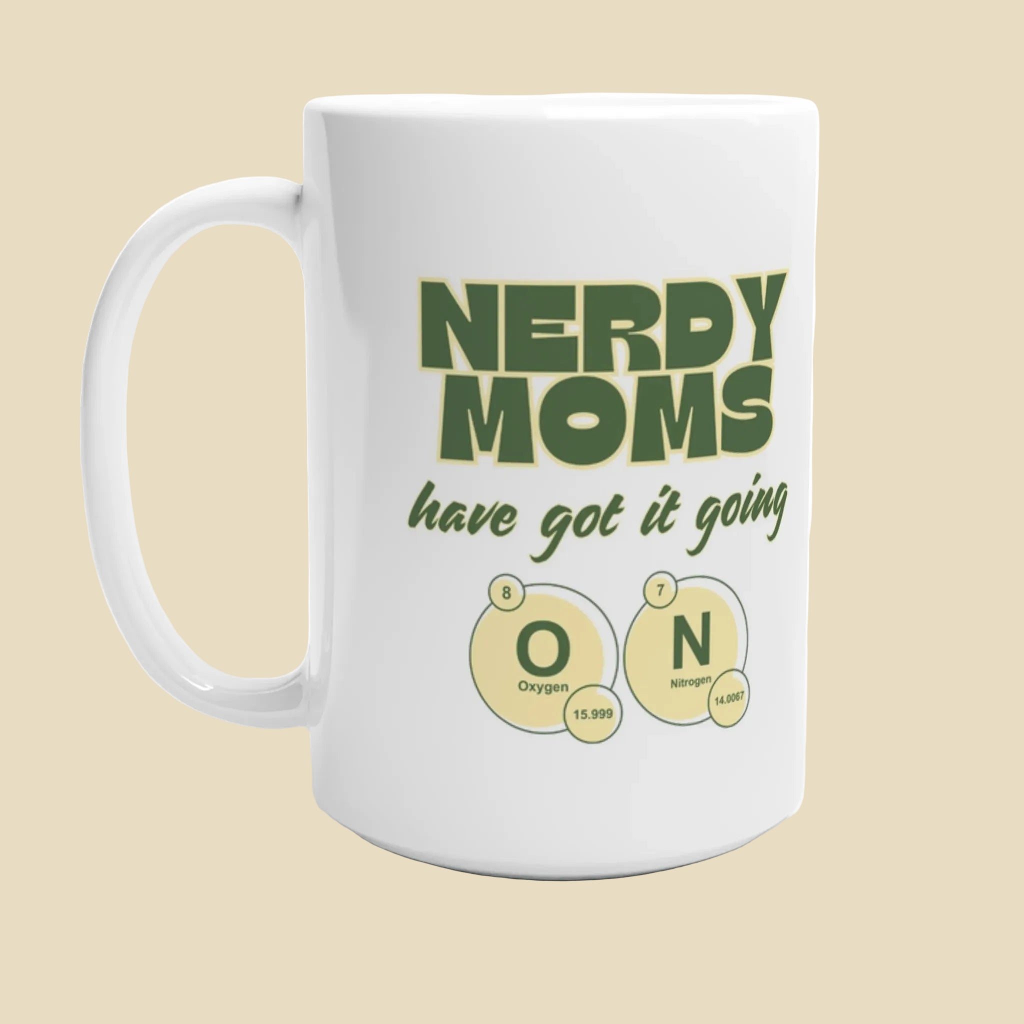 White mug with green text 'NERDY MOMS have got it going ON' on a white background