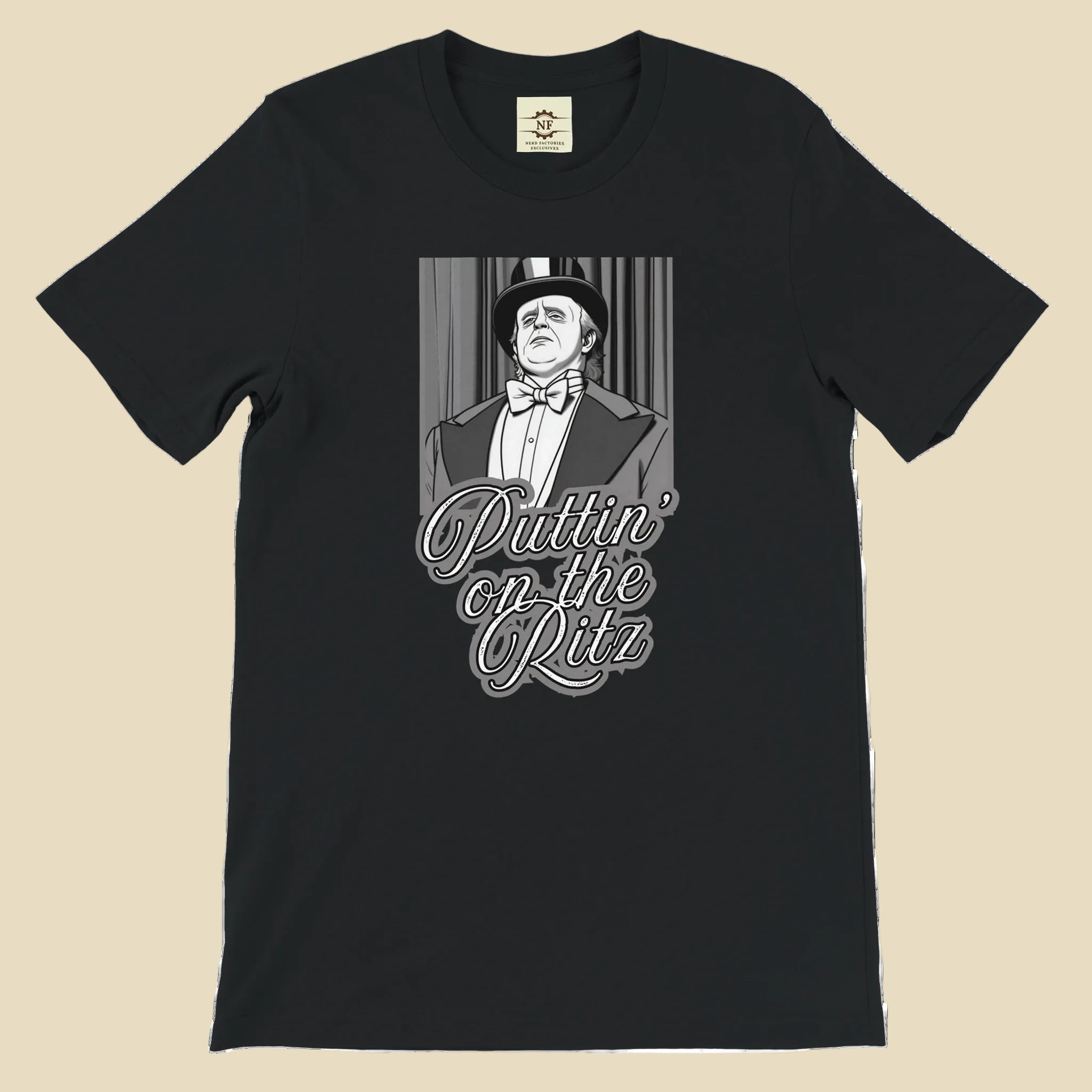 Black t-shirt with a graphic of a man in a suit and bow tie and text 'Puttin' on the Ritz'.
