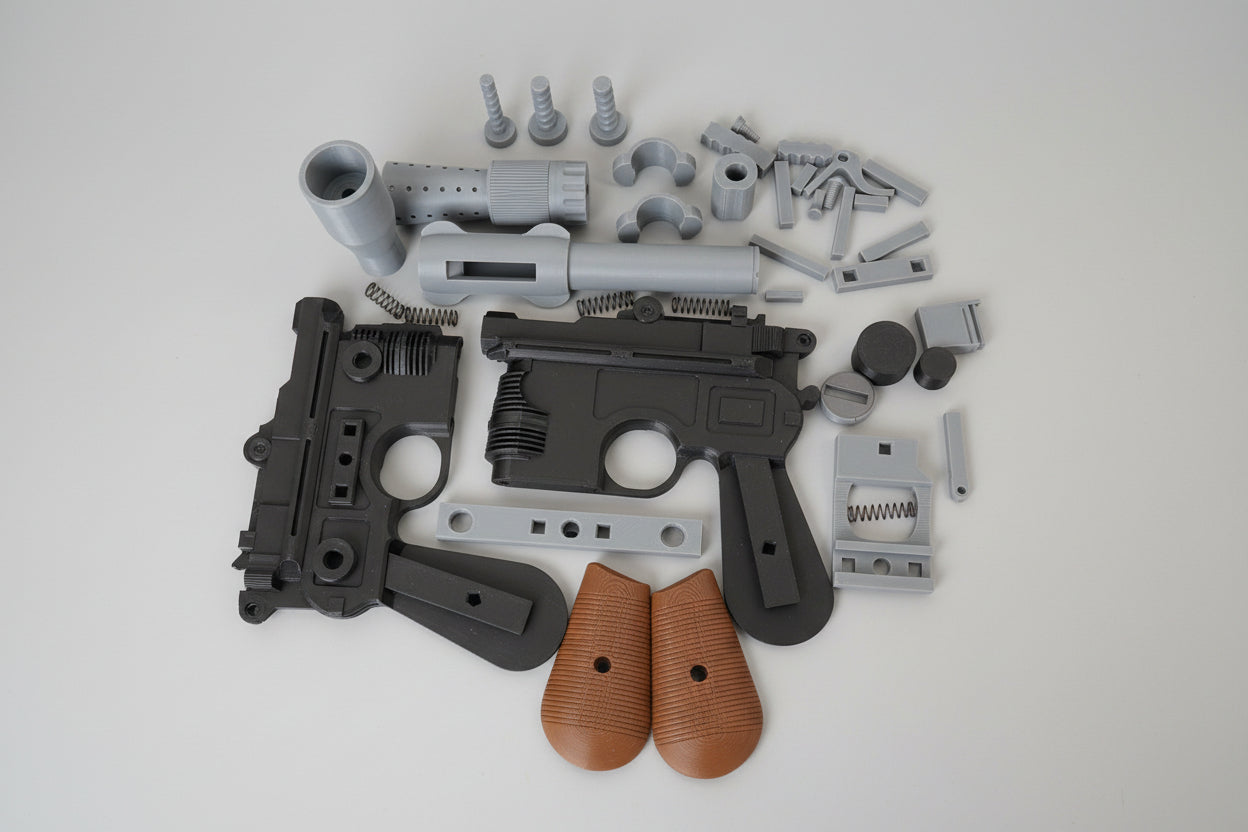 Disassembled gun on a wooden surface