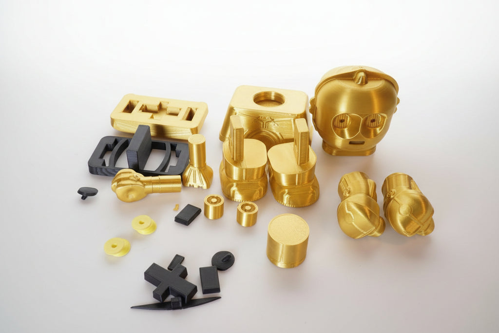 Gold and black mechanical parts on brown paper