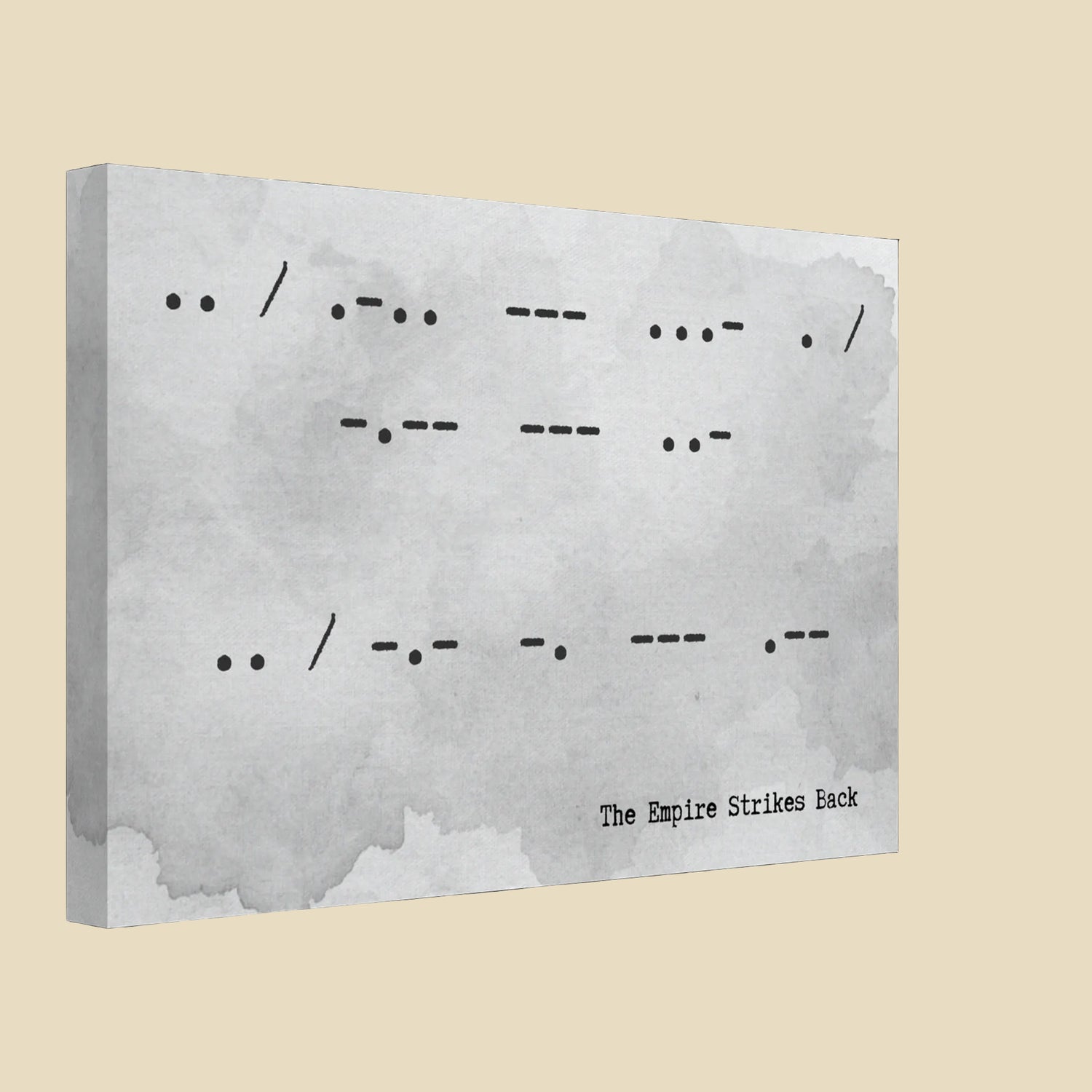 Canvas print with Morse code and 'The Empire Strikes Back' text on a textured gray background
